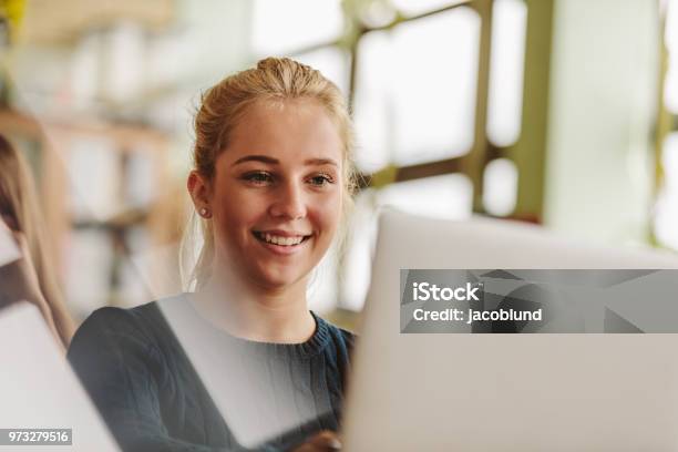 Girl Studying With Laptop In University Class Stock Photo - Download Image Now - Laptop, Teenager, University Student