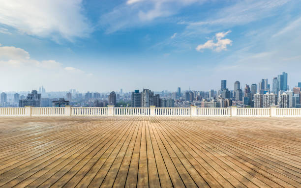 istock Panoramic skyline and modern business office buildings with empty road,empty concrete square floor 973279576