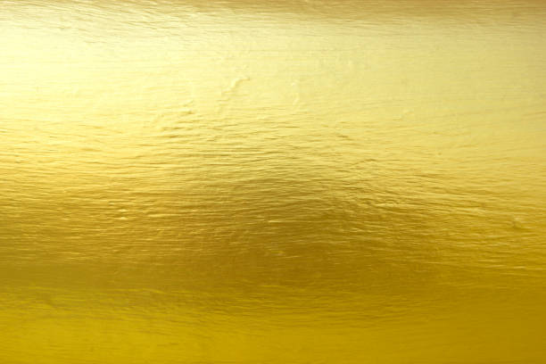 istock Metal Gold Background 973280410