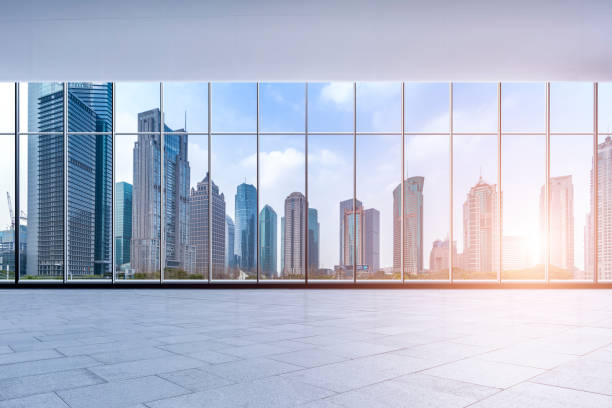 istock Panoramic skyline and buildings from glass window 973282858