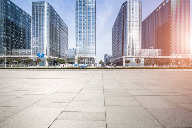istock Panoramic skyline and modern business office buildings with empty road,empty concrete square floor 973282964