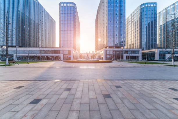 istock Panoramic skyline and modern business office buildings with empty road,empty concrete square floor 973283974