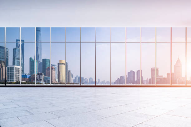 istock Panoramic skyline and buildings from glass window 973285298