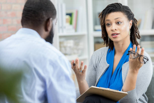 istock African American female therapist with patient 973286812