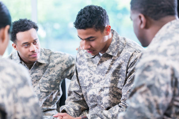 istock Soldiers support friend with PTSD 973288866