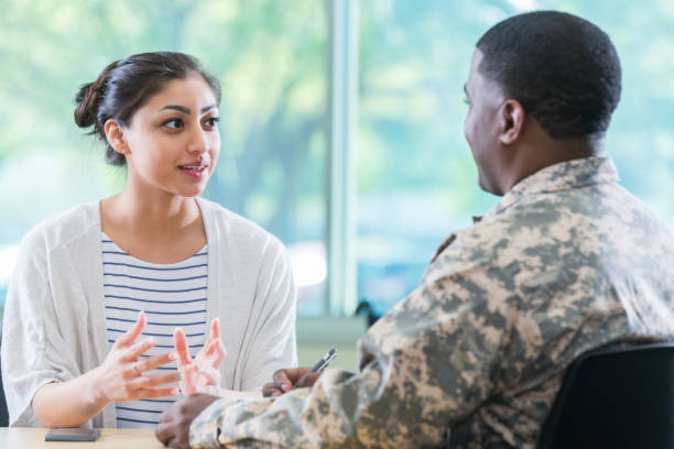 istock Army recruitment officer talks with new recruit 973288882