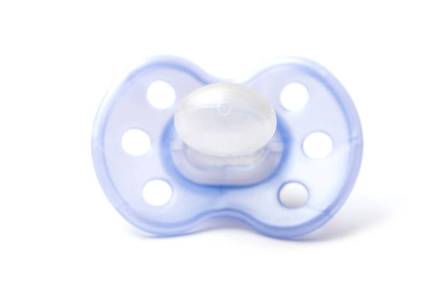 istock baby nipple on white background 973289152
