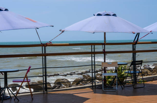 istock Outdoor umbrellas(Parasols) at seaside. 973294104