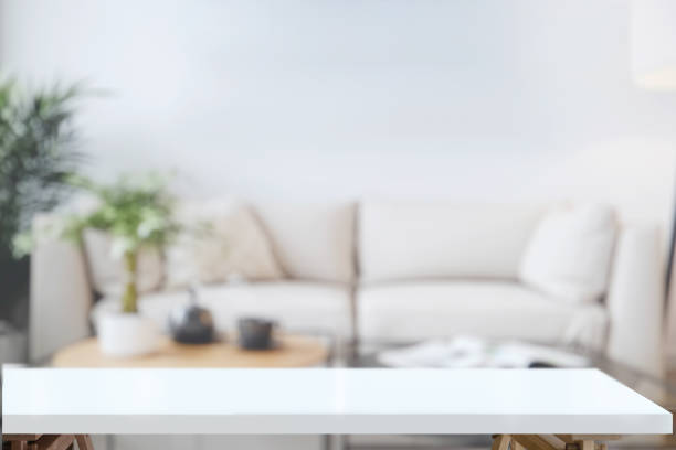 istock White table in living room background. 973296810