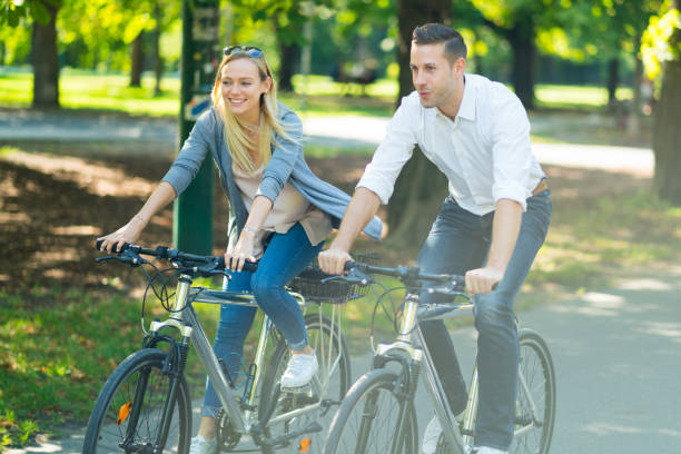 istock happy couple on bicycles 973300752