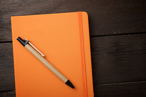 Notebook view on a wood table