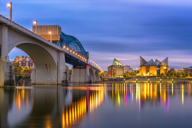 Chattanooga, Tennessee, USA downtown skyline on the Tennessee River at dusk.