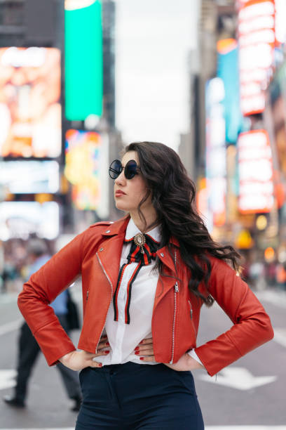 istock Woman in Times Square 973333692