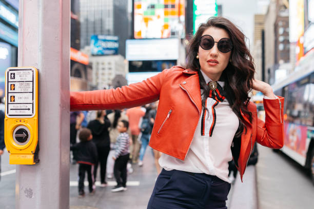istock Woman in Times Square 973333714