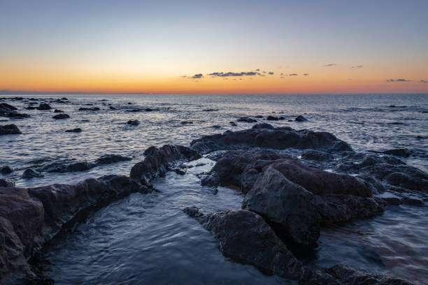 istock Sardinia sunrise in Cala Gonone, Italy 973334080
