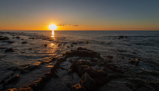 istock Sardinia sunrise in Cala Gonone, Italy 973334166