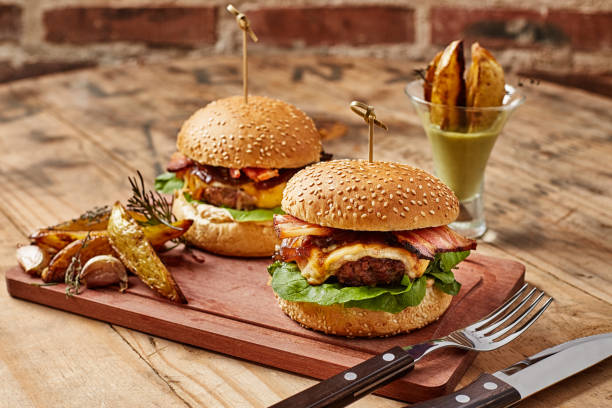 istock Hamburguer on wood talbe 973338836