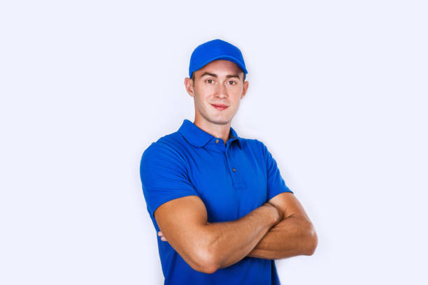 istock Delivery Concept: Portrait Young caucasian Handsome delivery man or courier 973342926