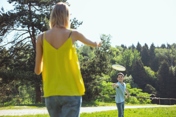 istock Loving mother playing with her son 973346616