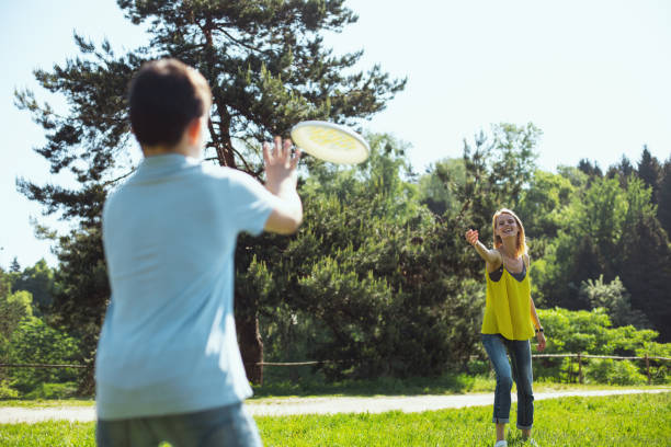 istock Cheerful mother playing with her son 973346796