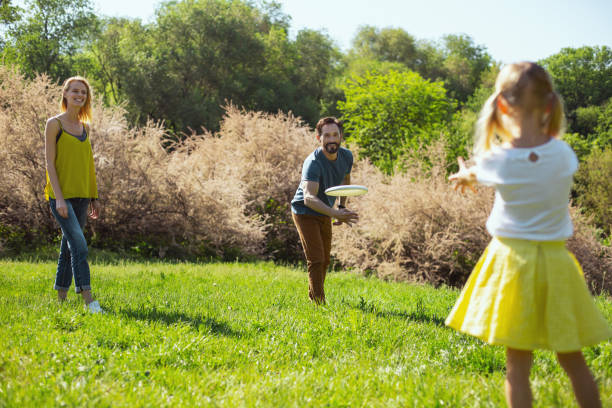 istock Loving parents playing with their daughter 973347012
