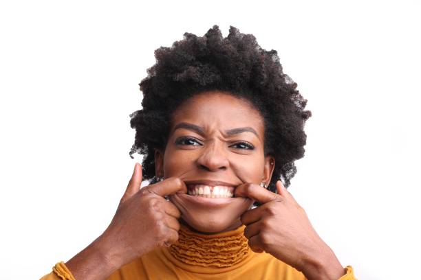 istock Girl with a funny face 973347346