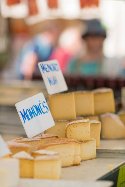 istock Different aged cheese on a market stall in spain 973348072