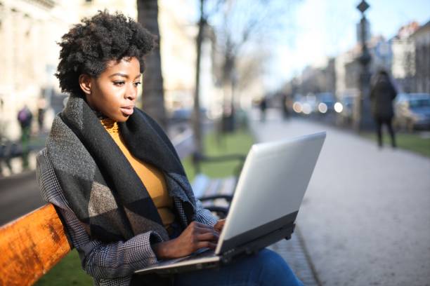 istock Girl with a laptop 973351060