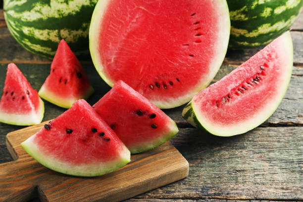 istock Slices of watermelons on cutting board 973351386