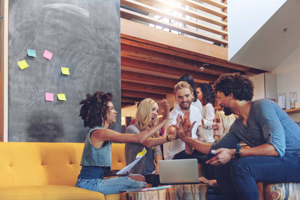 Young entrepreneurs celebrating