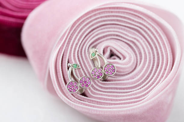 istock Cherry shaped earrings with pink crystals on ribbon 973367144