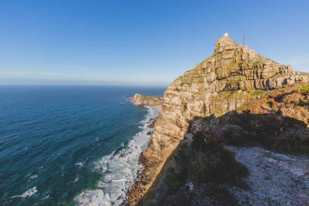 istock Cape Point Lighthouse on a perfect day 973375108