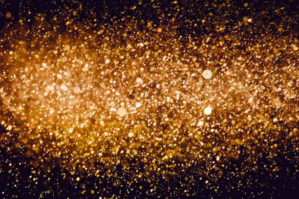 istock Christmas blur bokeh background texture abstract light glittering stars on bokeh. glitter vintage lights background 973378756