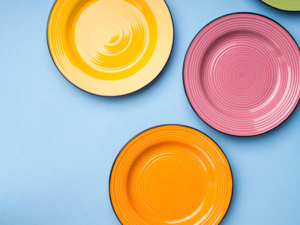 istock Colorful ceramic dishes. Flat lay 973385310