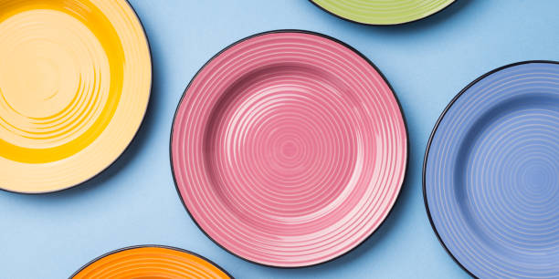 istock Colorful ceramic dishes. Flat lay 973385322