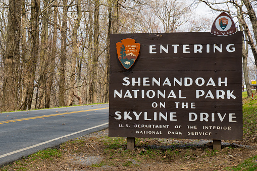VIRGINIA, USA - APRIL 19, 2018: Welcome to Shenandoah National Park Roadside Sign on the Highway