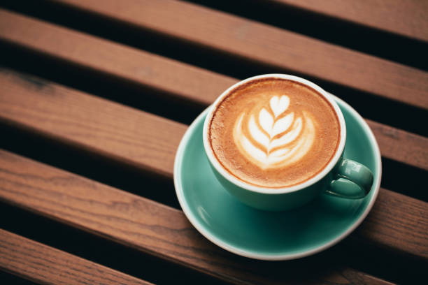 istock Cup of cappuccino with beautiful foam. 973410756