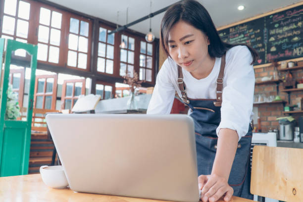 istock Young startup owner small cafe shop. 973411000