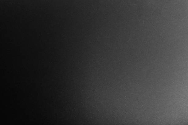 istock black paper texture or background with spotlight, dark wall backdrop wallpaper, dark tone. 973416168