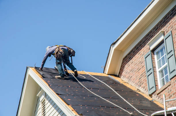 Roofing Contractors Replacing Damages Roofs After a Hail Storm stock photo