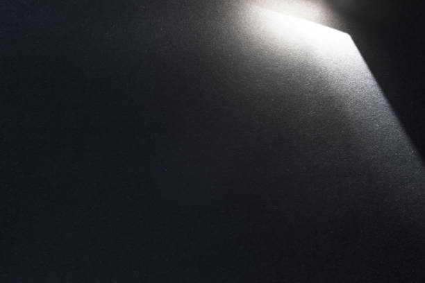 istock black paper texture or background with spotlight, dark wall backdrop wallpaper, dark tone. 973422872