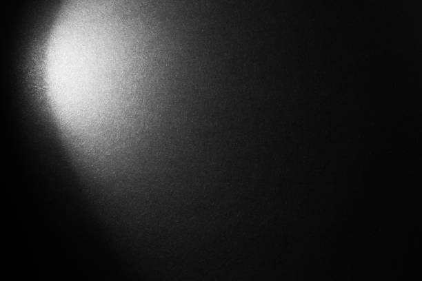 istock black paper texture or background with spotlight, dark wall backdrop wallpaper, dark tone. 973426644