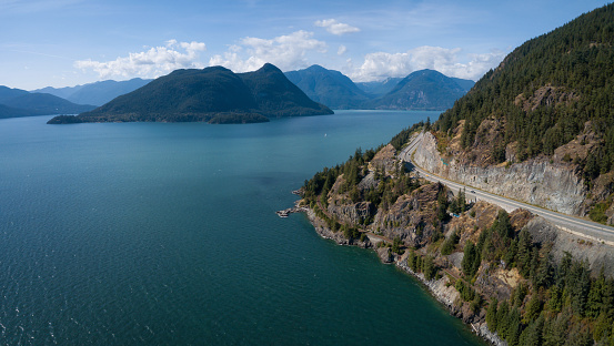 Aerial view of the Sea to Sky Highway in Howe Sound, North of Vancouver, British Columbia, Canada.