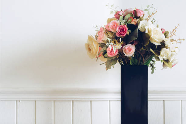 istock Flowers with soft pastel colors on a white background 973431180