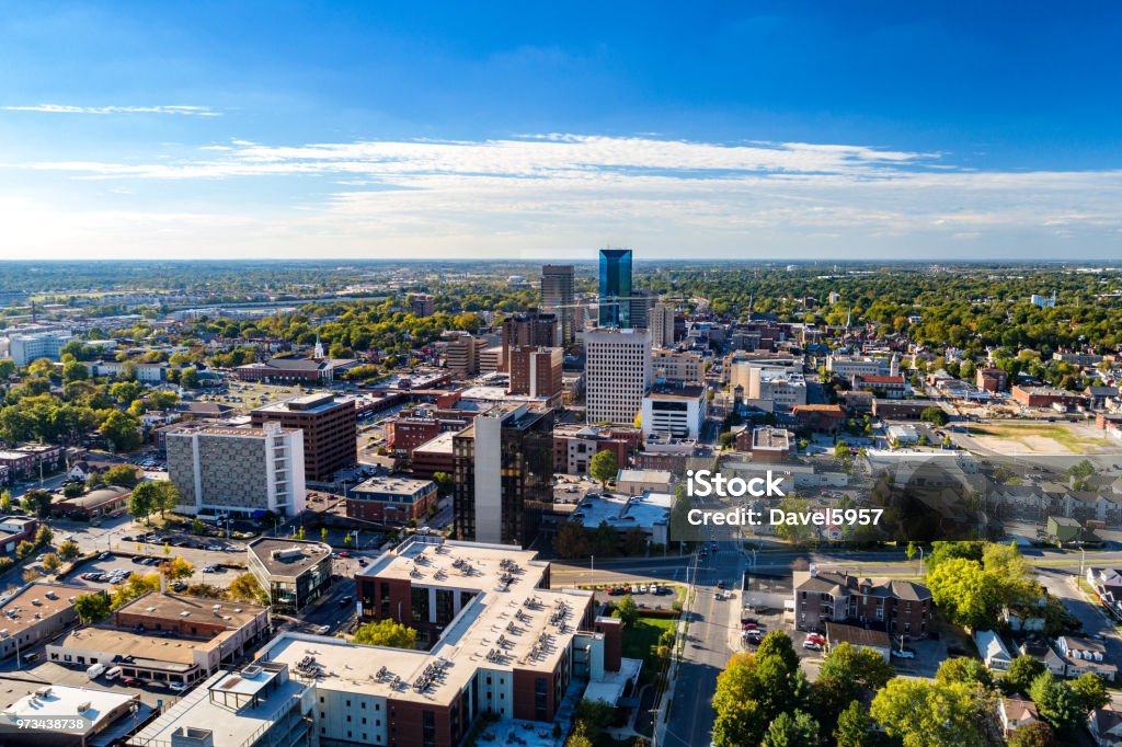 Lexington, KY Downtown Aerial View With Clouds And Blue Sky Aerial view of Downtown Lexington, Kentucky with a blue sky with clouds and the metropolitan area cityscape in the background. Lexington - Kentucky Stock Photo