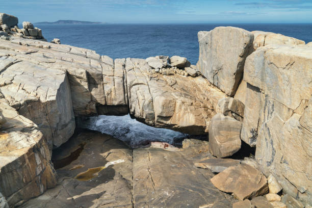 Natural bridge within the amazing Torndirrup National Park close to Albany, Western Australia