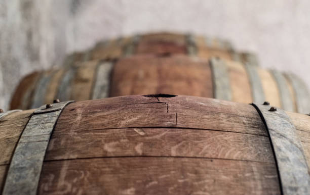 French Oak Wine Barrel in Beaujolais Wine cellar French Oak Wine Barrel in Beaujolais Wine cellar, in Selene Estate beaujolais region stock pictures, royalty-free photos & images