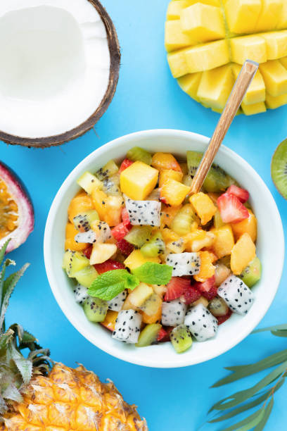 Healthy Fruit Salad With Mango Pineapple Peach And Pitaya On