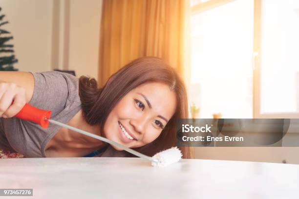 Happy Asian Woman Painting And Smiling Stock Photo - Download Image Now - Adult, Adults Only, Art