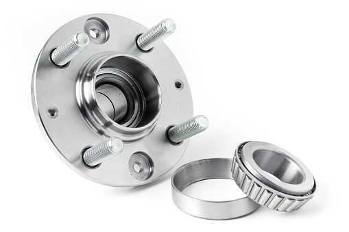 Wheel and wheel bearing on white background. Auto parts
